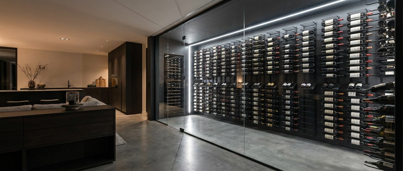 A contemporary residential wine cellar with a floor-to-ceiling glass wall, matte-black cantilevered metal wine racks holding bottles label-out, and integrated LED strip lighting.